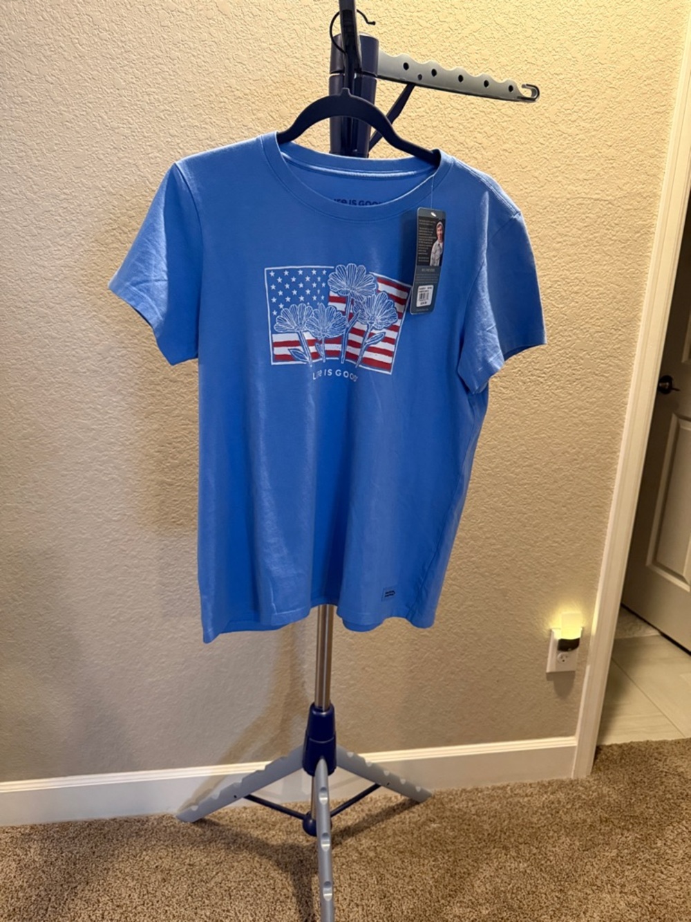 Life Is Good Blue Short-Sleeve Tee with Flag Floral Graphic. Size Large